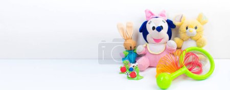 Foto de Colección de juguetes de colores sobre fondo blanco, bandera - Imagen libre de derechos