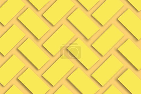 Foto de Burla de pilas de tarjetas de visita de oro dispuestas en filas sobre un fondo de papel de textura amarilla - Imagen libre de derechos