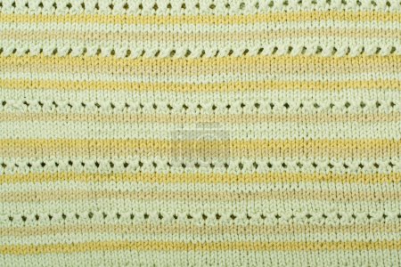 Photo for Sweater or scarf fabric texture large knitting. Knitted jersey background with a relief pattern. Wool hand- machine, handmade - Royalty Free Image