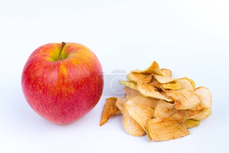 Photo for Homemade organic sliced, dried apples, fresh juicy apples on white background - Royalty Free Image