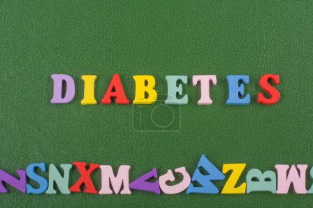Photo for DIABETETES word on green background composed from colorful abc alphabet block wooden letters, copy space for ad text. Learning english concept - Royalty Free Image