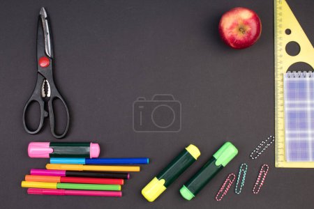 Photo for Back to school. Stationery on a black table. Office desk with copy space. Flat lay - Royalty Free Image