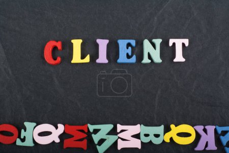 Photo for Word on black board background composed from colorful abc alphabet block wooden letters, copy space for ad text. Learning english concept - Royalty Free Image
