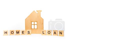 Photo for Home loans- word composed fromwooden blocks letters on White background, wooden house symbol. copy space for ad text. Banner - Royalty Free Image