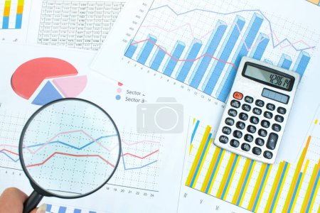 Photo for Financial printed paper charts, graphs and diagrams on the table - Royalty Free Image