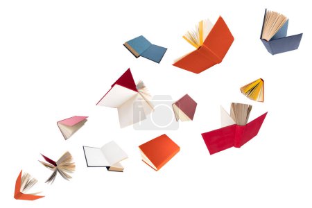 Foto de Coloridos libros de tapa dura volando aislados sobre fondo blanco - Imagen libre de derechos