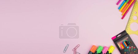 Photo for Back to school. Stationery on a pink table. Office desk with copy space. Flat lay - Royalty Free Image