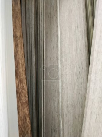 Photo for Artistic wooden background from different types of wood. Copy space for text - Royalty Free Image