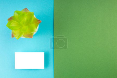 Photo for Business card blank over colorful abstract background. Corporate stationery branding mock-up. Copy space for text. Top view - Royalty Free Image