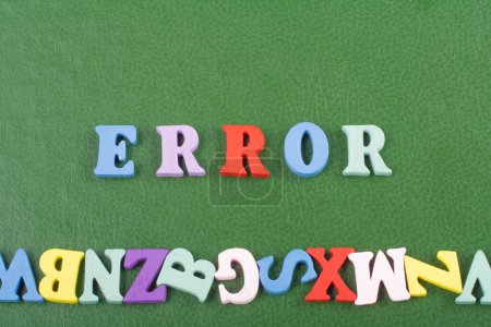 Photo for ERROR word on green background composed from colorful abc alphabet block wooden letters, copy space for ad text. Learning english concept - Royalty Free Image