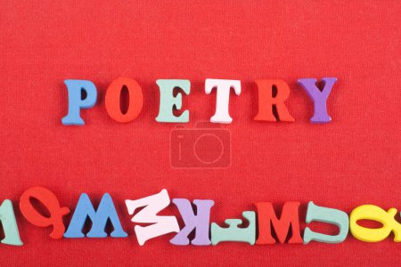 Photo for POETRY word on red background composed from colorful abc alphabet block wooden letters, copy space for ad text. Learning english concept - Royalty Free Image