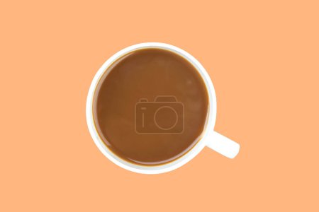 Photo for A cup of ground coffee isolated on a orange background. top view - Royalty Free Image