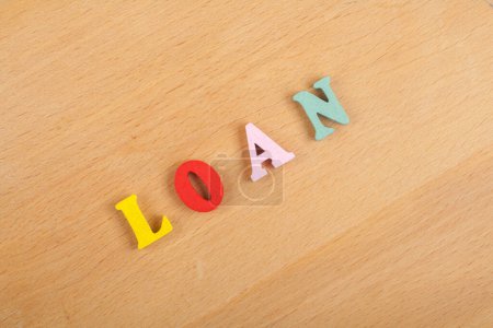 word on wooden background composed from colorful abc alphabet block wooden letters, copy space for ad text. Learning english concept