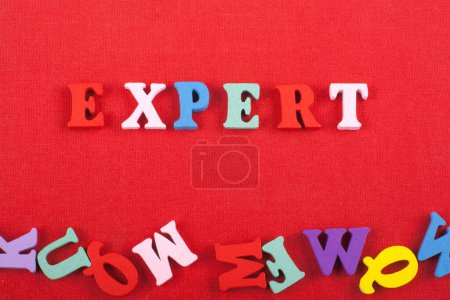 Photo for Word on red background composed from colorful abc alphabet block wooden letters, copy space for ad text. Learning english concept - Royalty Free Image