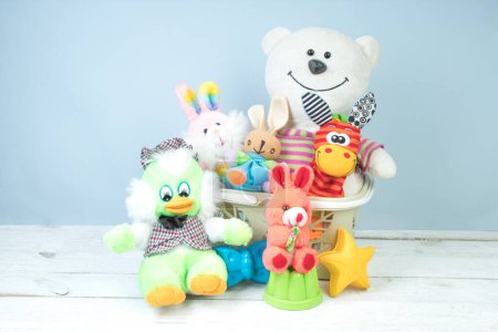 Foto de Colección de juguetes de colores sobre un fondo azul claro. Juguetes infantiles - Imagen libre de derechos