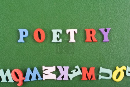 Photo for POETRY word on green background composed from colorful abc alphabet block wooden letters, copy space for ad text. Learning english concept - Royalty Free Image