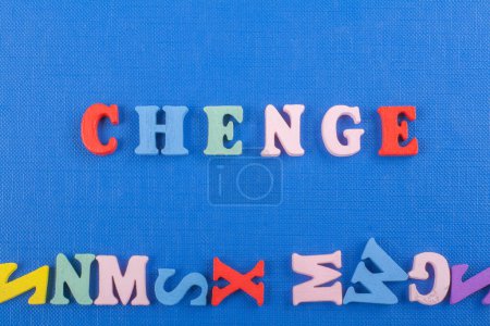 word on blue background composed from colorful abc alphabet block wooden letters, copy space for ad text. Learning english concept.