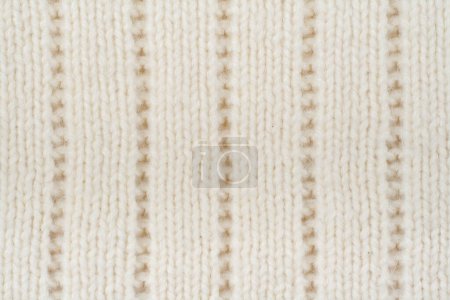 Pullover oder Schal Stoff Textur große Strickwaren. Gestrickter Jersey Hintergrund mit Reliefmuster. Handarbeit aus Wolle, handgemacht