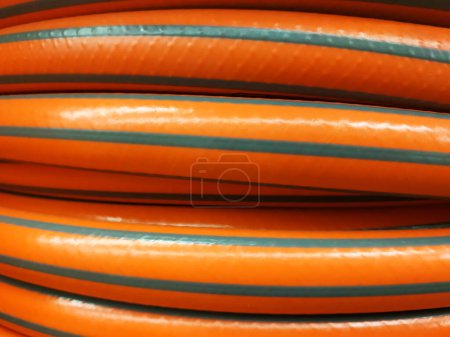 Household goods. A reinforced long water hose.