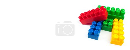 Lot of colorful rainbow toy bricks background. Educational toy, constructor for children Isolated on white background. 3D Rendering. Top view with copy space. Banner
