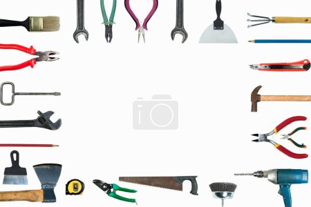 Tool collage isolated on a white background depicting carpentry and construction tools. Top view