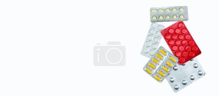 Photo for Pharmaceuticals pills, tablet and capsules medicine on white background. to take medicine. Banner - Royalty Free Image