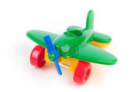 Multicolored eraser plane on a white background. The concept of flight and travel by air. Aircraft. preschool education