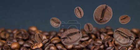 Photo for Falling coffee beans. Flying defocused coffee beans. Used for cafe advertising, packaging, menu design. Banner - Royalty Free Image