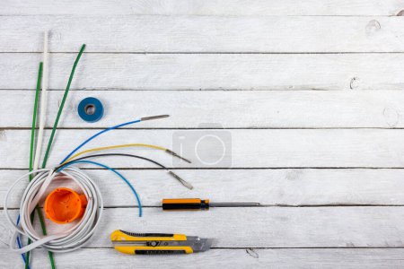 Photo for Professional repairing implements for decorating and building renovation set on the wooden background. Top view - Royalty Free Image