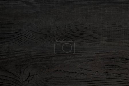 Photo for Black Wood texture background. Hardwood, wood grain, organic material grunge style. Vintage wooden surface top view. Wooden table top view. Copy space for text - Royalty Free Image