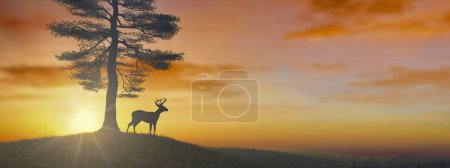 A solitary deer stands beneath a sprawling tree, silhouetted against the vibrant hues of a sunset sky, evoking a peaceful end to the day.