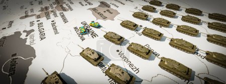 Modèle de chars disposés sur une carte 3D, représentant les tactiques militaires dans la région de l'Europe de l'Est.