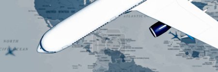 Téléchargez les photos : Vue rapprochée d'une aile d'avion en vol, face à une carte monochrome de la région de l'Atlantique Nord. - en image libre de droit