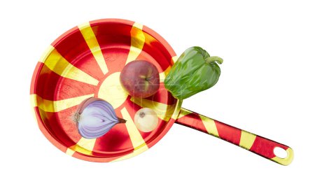 An evocative food arrangement on a pan emblazoned with the warm hues and sunburst emblem of the Macedonian flag.