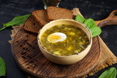 Photo for Green soup with sorrel, meat and egg. Traditional sorrel borscht - Royalty Free Image