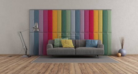 Photo for Colorful fabric paneling in a modern room with gray sofa on hardwood floor - 3d rendering - Royalty Free Image