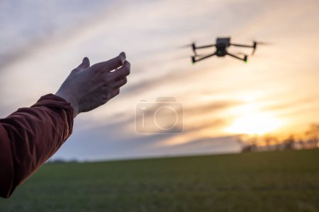 Photo for Palm Piloted Flight Drone Takeoff and Landing from the Hand - Royalty Free Image