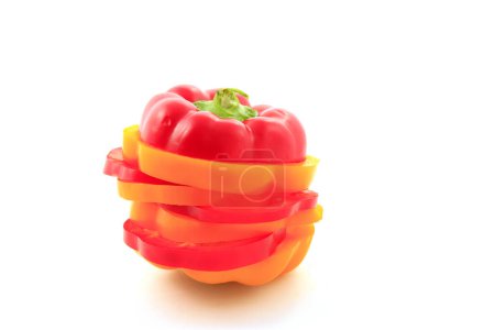 Foto de Chopped color pepper on white background - Imagen libre de derechos