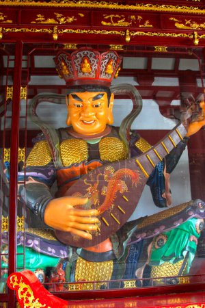 Téléchargez les photos : Buddhist reliefs on the walls in a temple, china - en image libre de droit