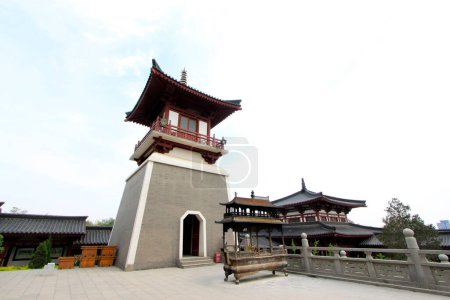 Photo for TANGSHAN - MAY 10: Bell tower and drum tower in Xingguo temple on May 10, 2014, tangshan city, hebei province, China. - Royalty Free Image