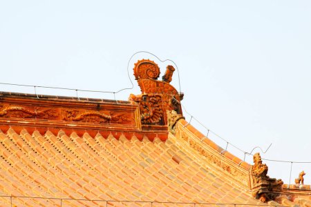 Photo for Temple eaves and beast sculpture, closeup of photo - Royalty Free Image