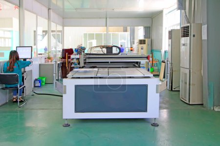 Photo for TANGSHAN CITY - MAY 28: Large ink jet printers in a production workshop, on may 28, 2014, Tangshan city, Hebei Province, Chin - Royalty Free Image