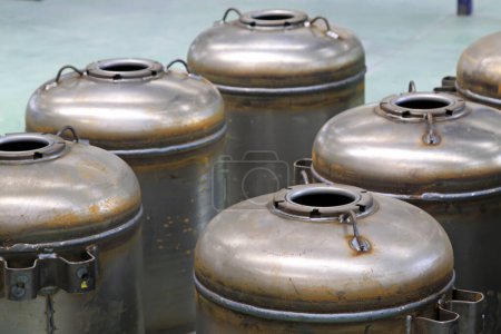 Photo for Stainless steel pressure tanks in a production workshop, closeup of photo - Royalty Free Image
