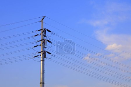 Photo for Electric steel poles in the blue sky background - Royalty Free Image