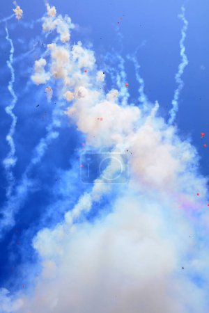 Photo for Firecracker smoke in the blue sky - Royalty Free Image