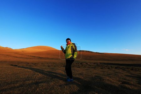 Foto de Inner Mongolia, China - October 2, 2017: Tourists visit in Keshiketeng World Geopark, Inner Mongolia, Chin - Imagen libre de derechos