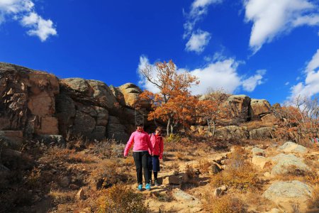 Photo for Inner Mongolia, China - October 3, 2017: tourists visit Qingshan Park, Keshiketeng World Geopark, Inner Mongolia, China - Royalty Free Image