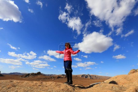 Foto de Inner Mongolia, China - October 3, 2017: tourists visit Qingshan Park, Keshiketeng World Geopark, Inner Mongolia, China - Imagen libre de derechos