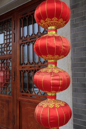 Photo for Red lanterns and antique wooden window - Royalty Free Image