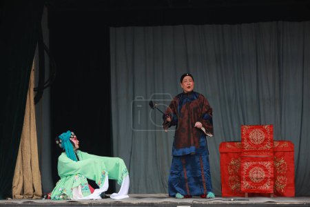 Photo for Luannan county - Feb 28, 2018: Chinese traditional costume drama performance on stage, luannan county, hebei province, China - Royalty Free Image